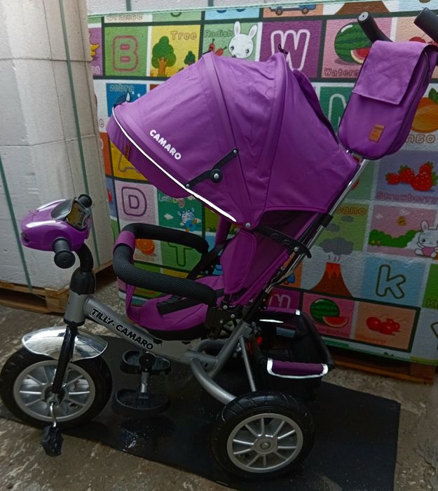 Продам детский музыкальный велосипед-коляска  Tilly Camaro почти новый.