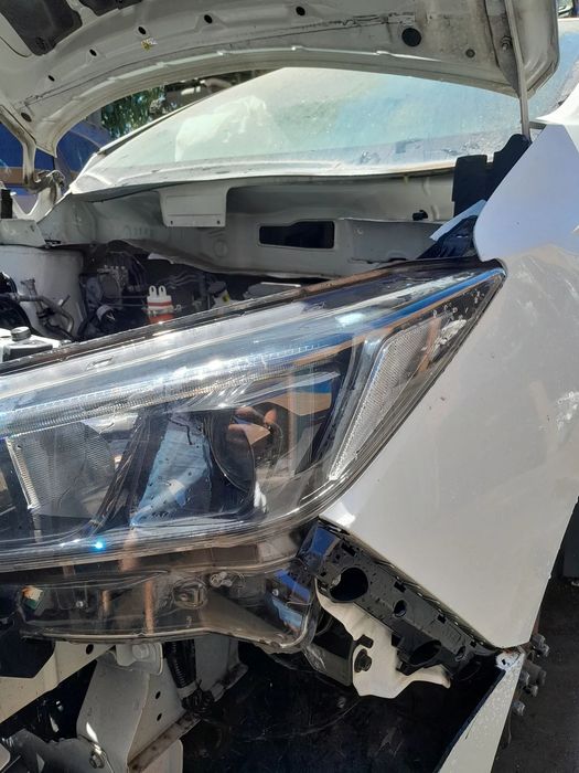 Ótica / farol esquerda NISSAN Leaf EV (ZE1)