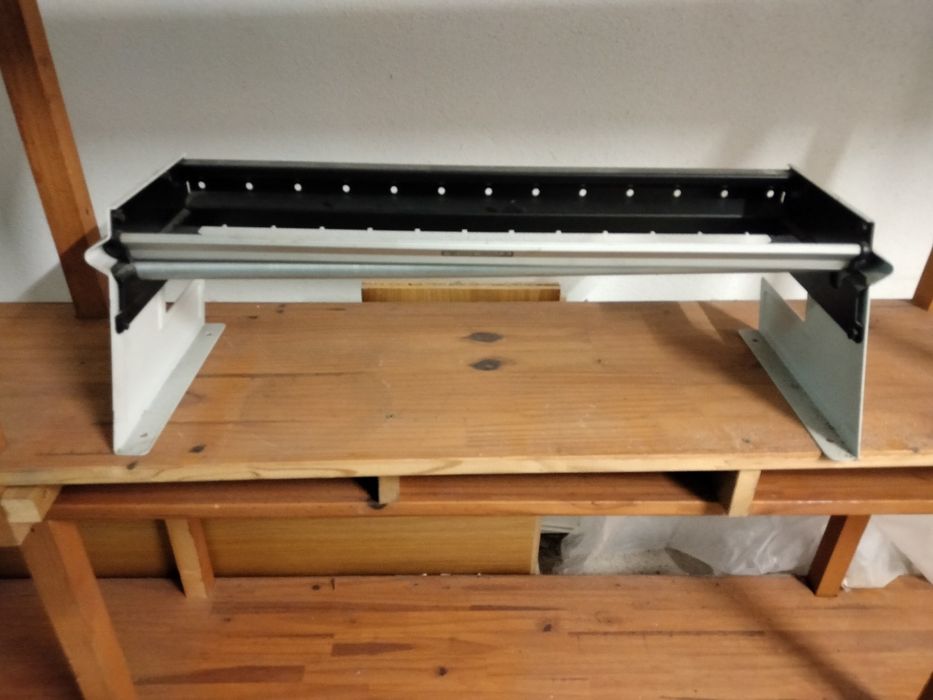 Dispensador de papel de embrulho.