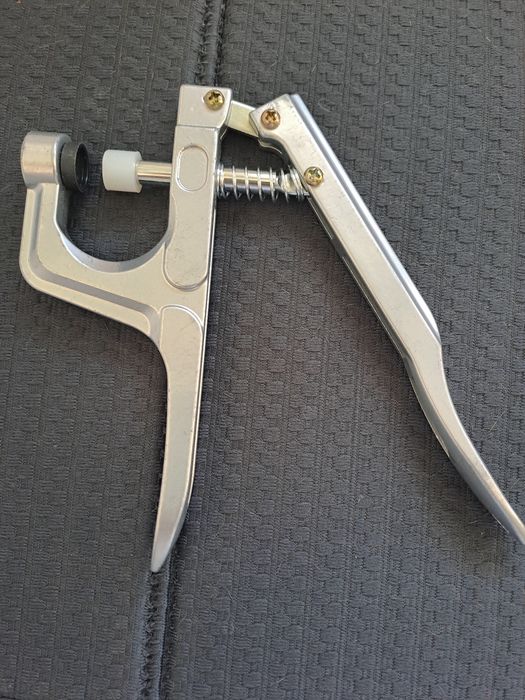 Caixa de molas multicor, mais o aplicador das mesmas