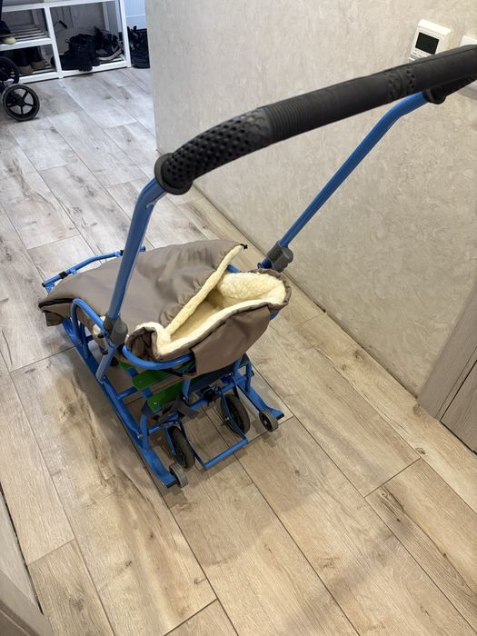 Дитячі санки на колесах