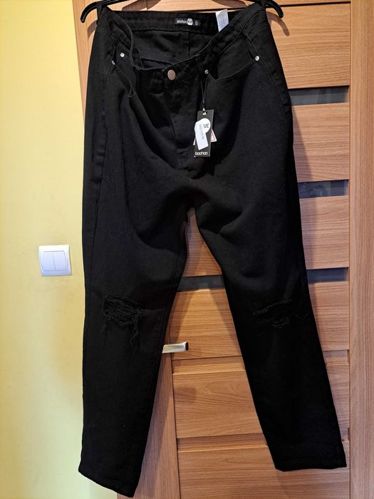 Spodnie jeans r. 46 z dziurami