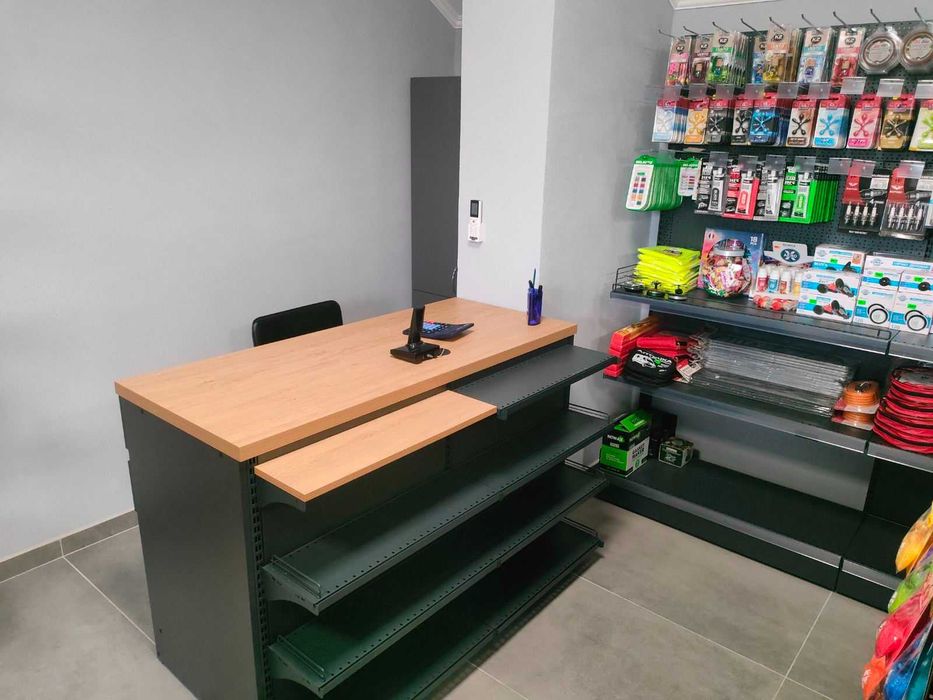 Стелажі в магазин, касові прилавки, холодильники