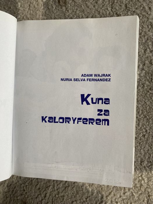 Kuna za kaloryferem. Adam Wajrak, Nuria Fernandez