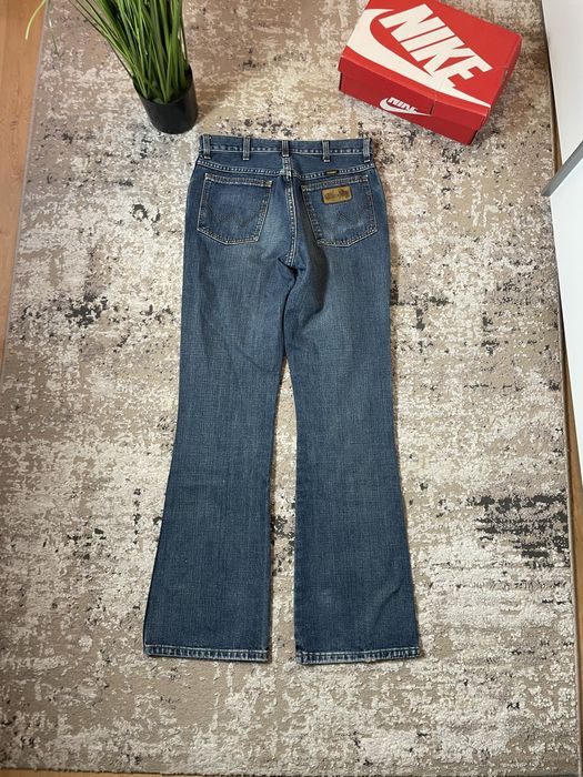 Spodnie jeansowe damskie dzwony wrangler W31L34