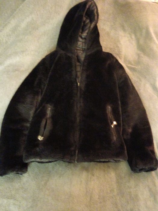 Куртка двостороння.