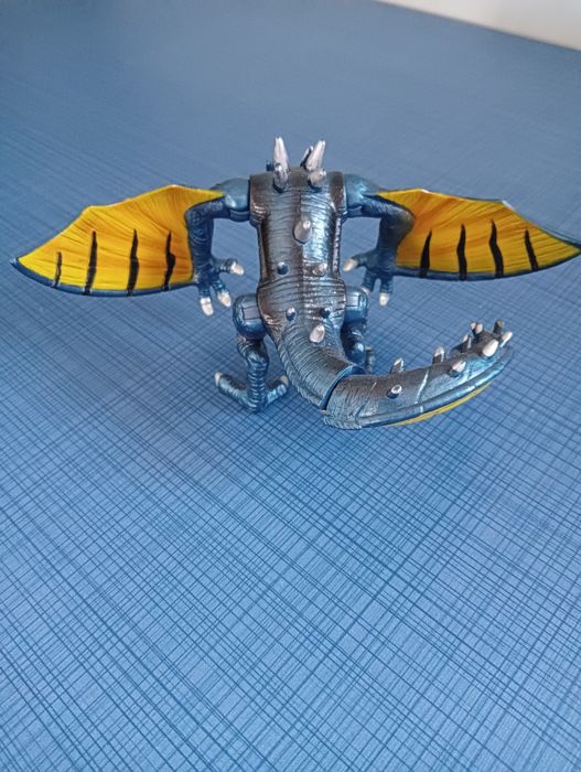 Brinquedo de dragão

- Dragão com detalhes em azul