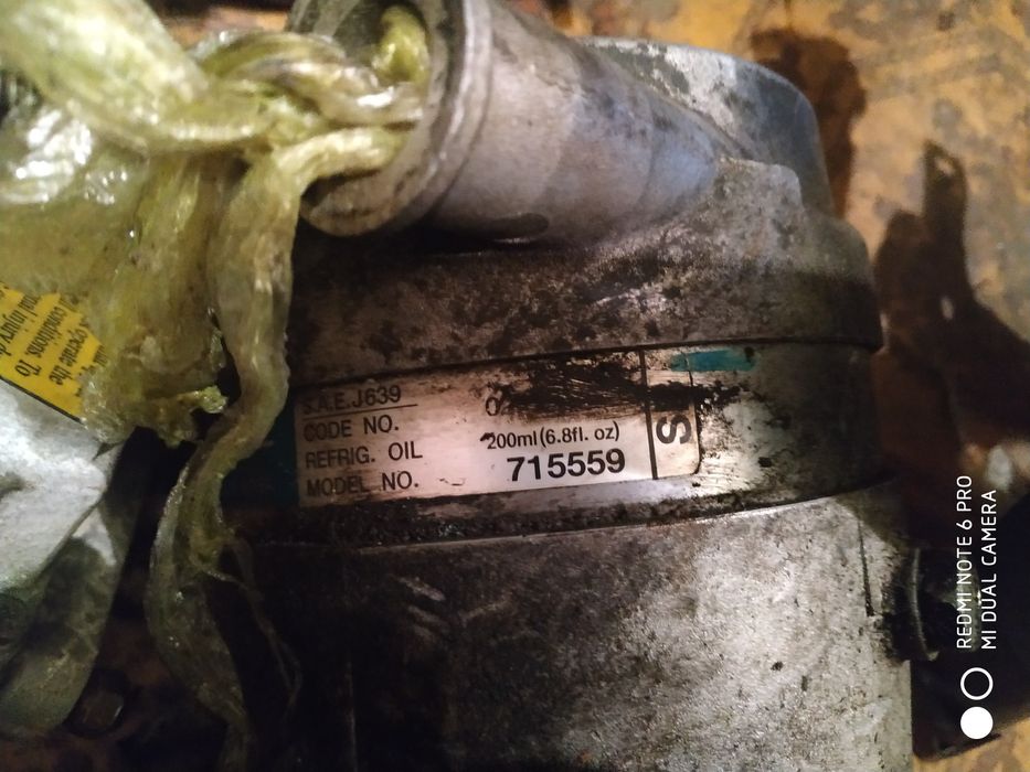 Chevrolet Aveo 04-11рік генератор 1.5