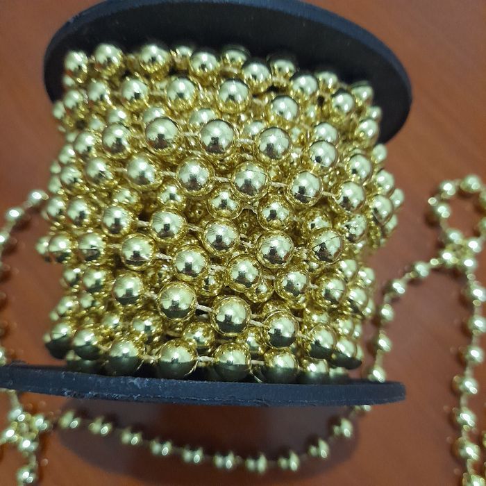 Bobine de perolas de natal