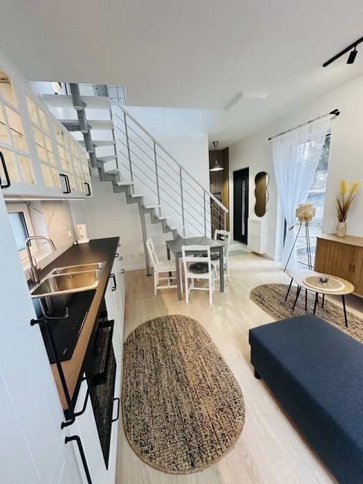 Nowe dwupoziomowe mieszkanie   z patio i ogrodem