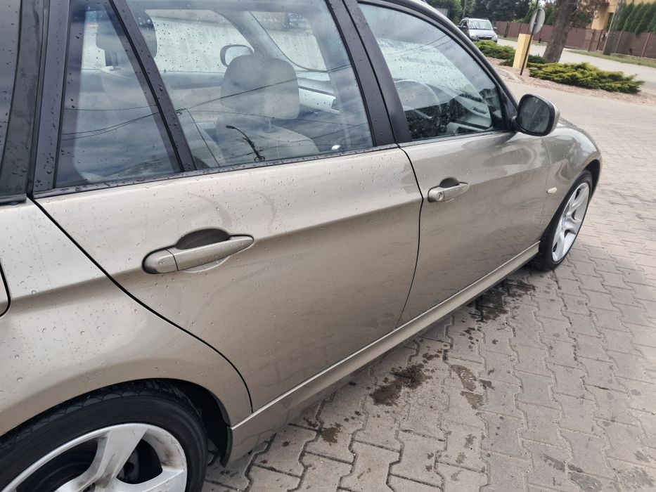 Kompletne drzwi l/p  przód tył BMW e90 e91 kolor A53