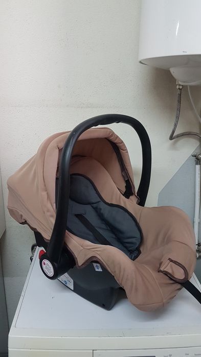 Maxicosi com redutor e toldo