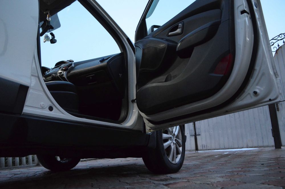 Hyundai ix35 2010 VIN KMHJU81CDBU167650 фото оголошення 12 з 24