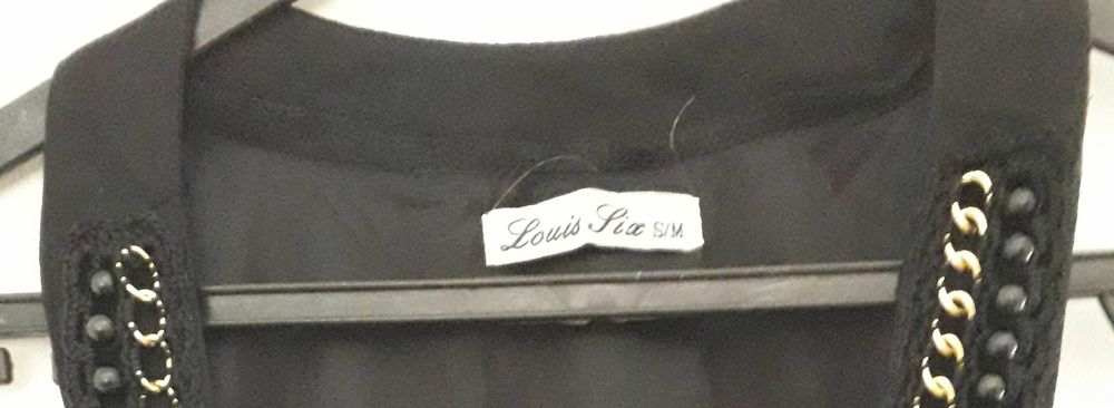 Top preto, Louis Six