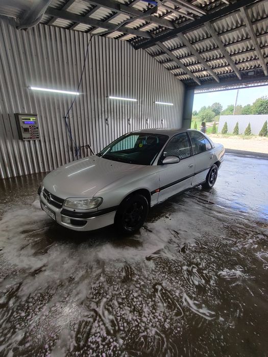 Опель омега б 2.0 газ бензин