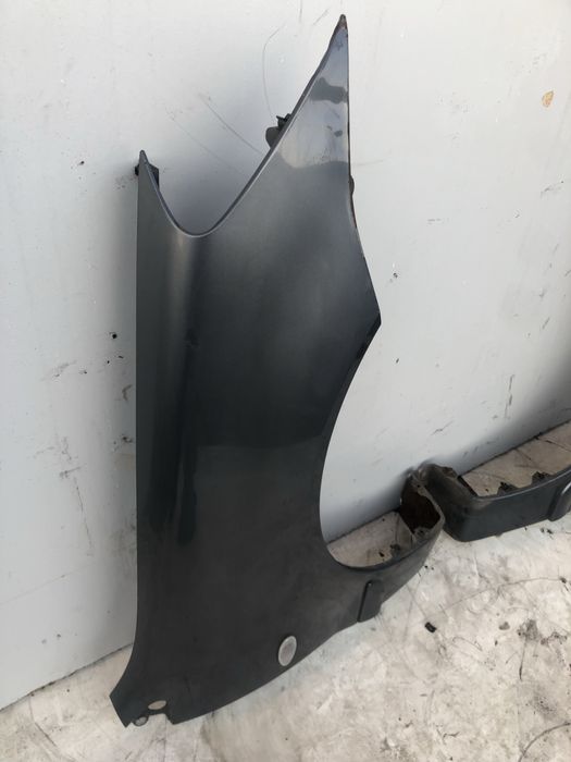 Передні крило ліве Mitsubishi Lancer 9