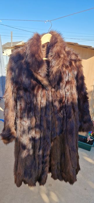 Casaco vizon em bom estado de conservação