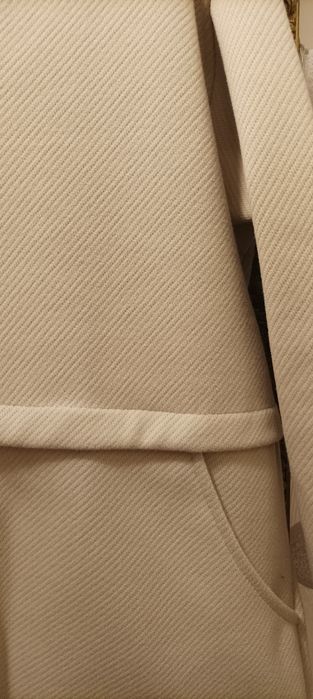 Płaszczyk damski w kolorze beżowym