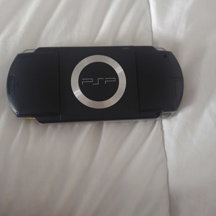 PSP Sony usada com carregador