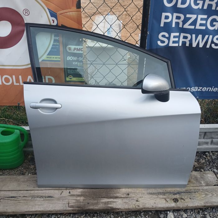 Drzwi prawe prawy przód przednie Leon II ls7y