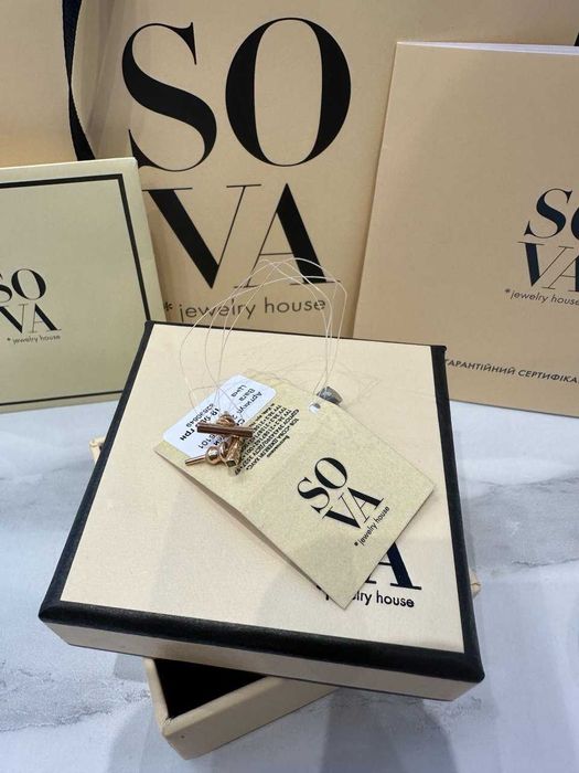 Стильные серьги из красного золота Sova