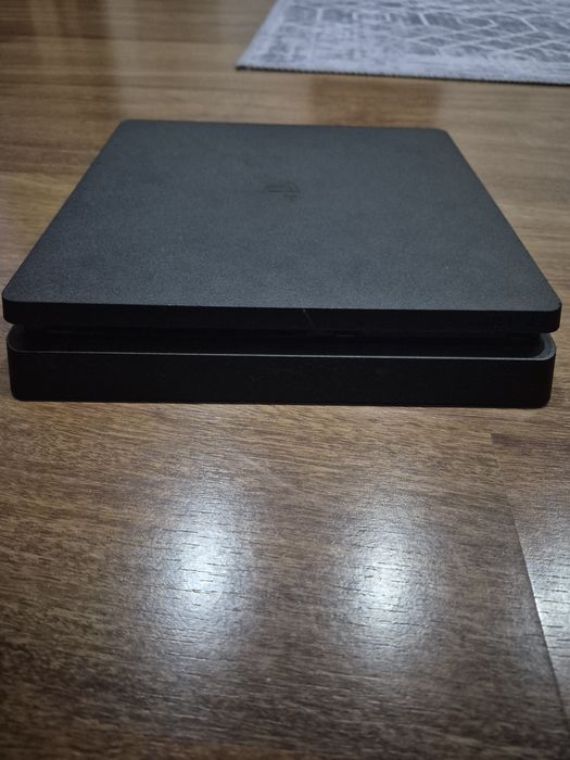 Playstation 4 + 2 comandos + 7 jogos