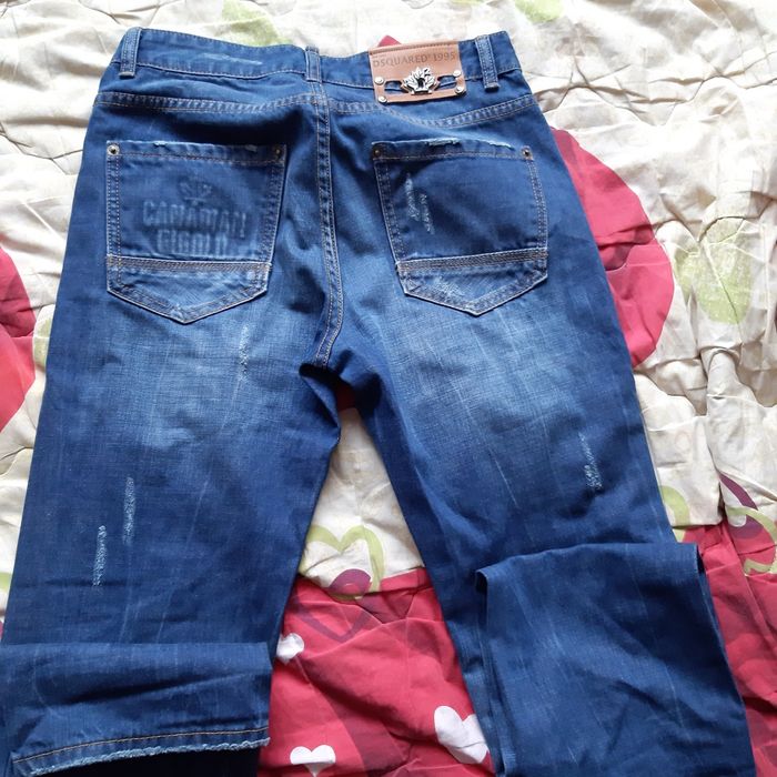 Фирменные джинсы