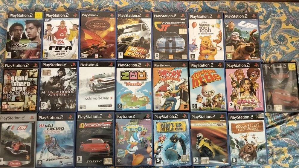 Consola Sony PlayStation 2 Slim Preta (SEM COMANDOS) + Volante Ferrari + Memory Card 64MB + pack de 23 jogos