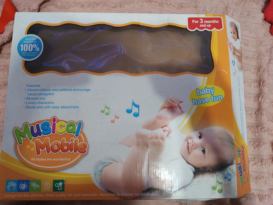 Музичний мобіль на ліжечко.