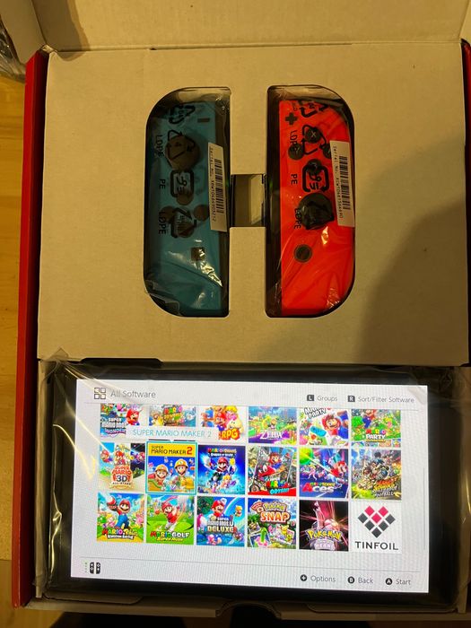 Nowa konsola Nintendo Switch OLED – przerobiona  + karta 256 GB + etui