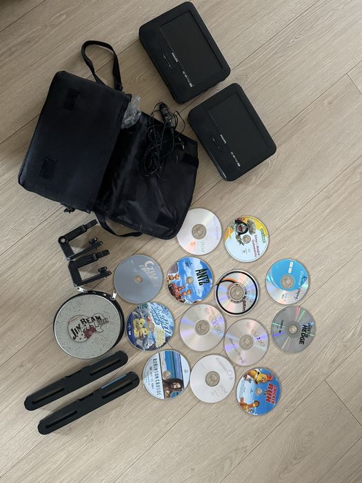 Zestaw DVD do samochodu przenośne Philips + filmy na długie trasy.