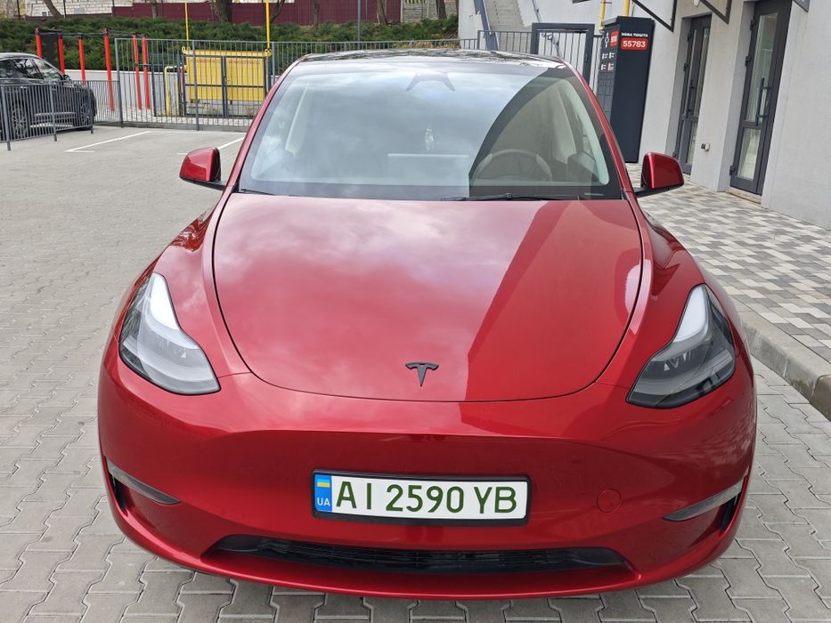 Tesla Model Y 2024 VIN 7SAYGAEEXRF056411 фото оголошення 5 з 23