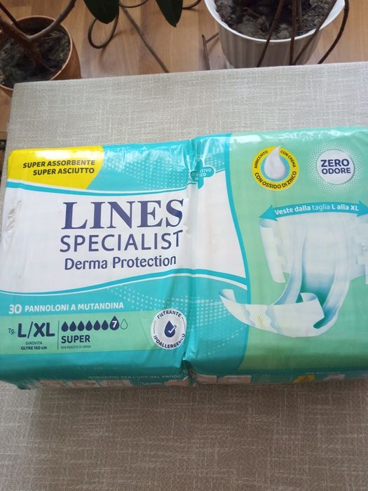 Продам підгузники L та XL.