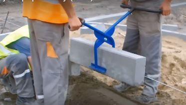 Chwytak poprzeczny do krawężników / kleszcze do krawężników / uchwyt