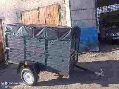НОВИЙ УНІВЕРСАЛЬНИЙ ПРИЦЕП с завода 2000/1300/410  Доставка. Гарантія.