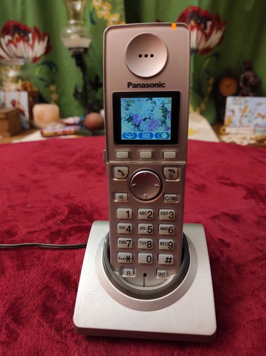 Telefon domowy bezprzewodowy Panasonic KX-TGA810PD + stacja + zasilacz