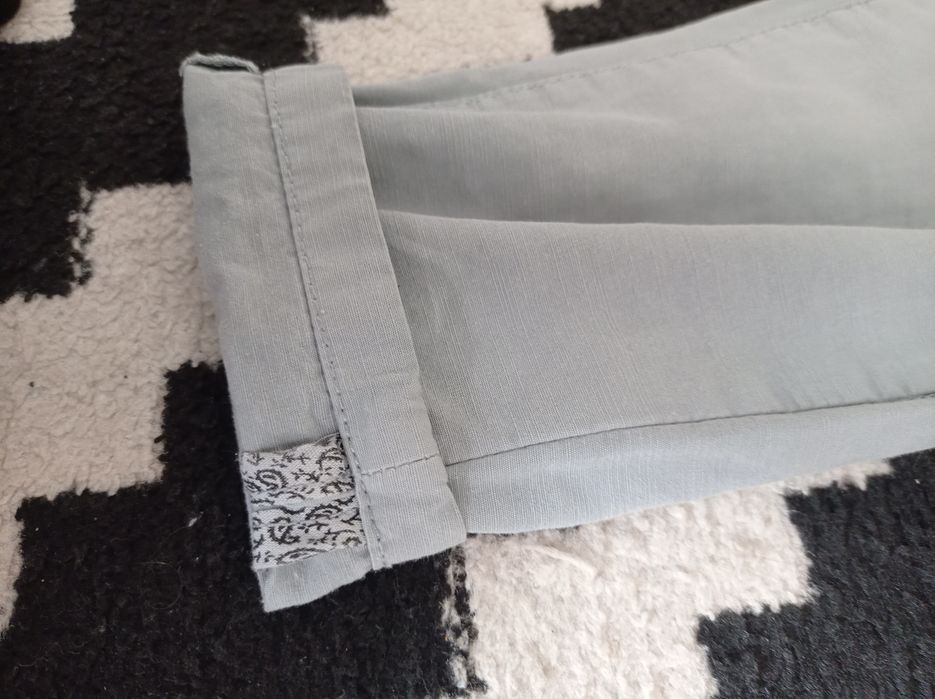 Spodnie bawełniane, eleganckie i wygodne. Reserved 110