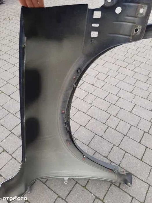 Volvo XC90 XC 90 błotnik lewy przód przedni z listwą granatowy