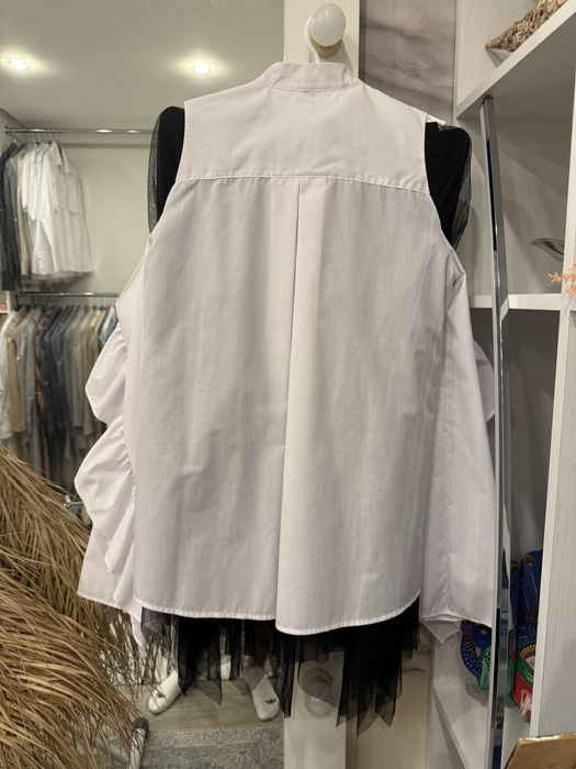 Дизайнерська біла сорочка незвичайного крою