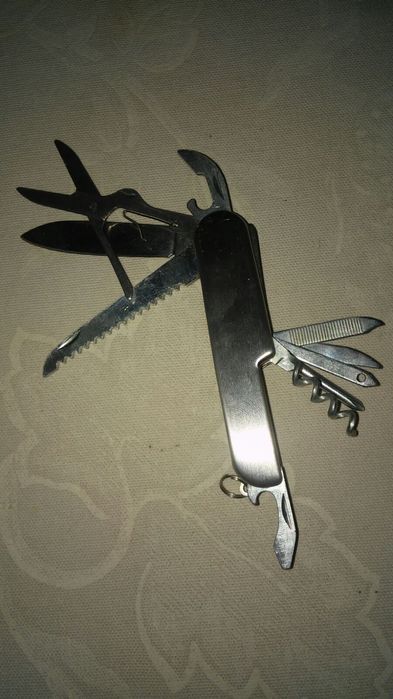 Нож новый многофункциональный