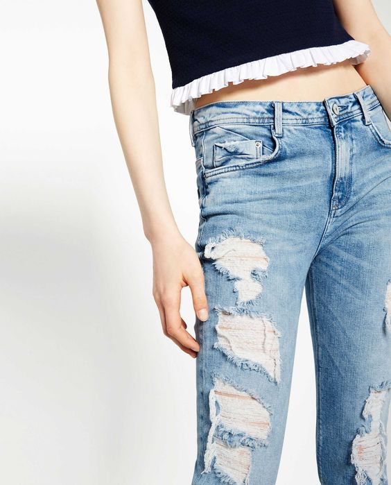Nowe jeansy Zara z dziurami