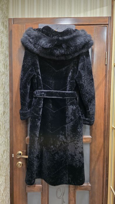 Жіноча шуба з мутону.