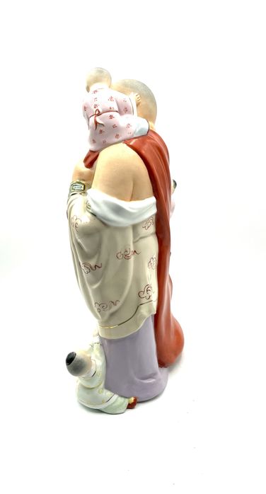 Buda em porcelana antigo