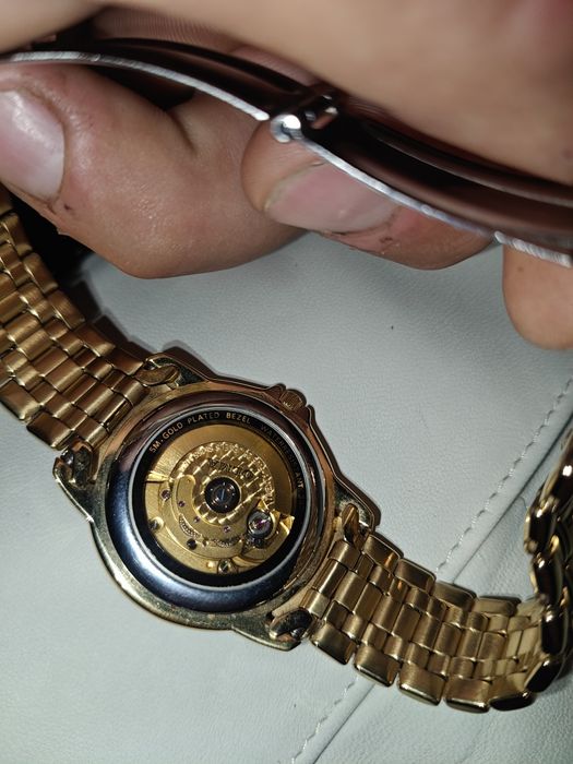 OLMA Automatic 5m gold-plated bezel