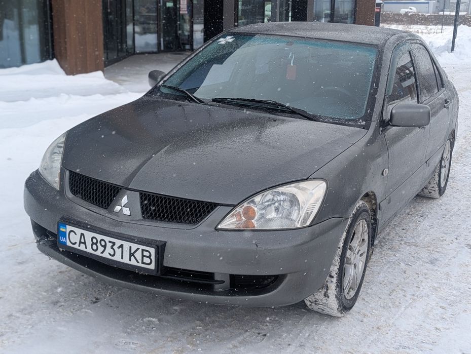 Mitsubishi lancer 1.6 газ бензин 2006