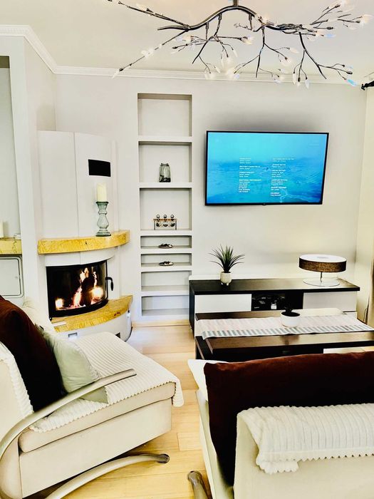 Apartament z widokiem  z sauną i kominkiem.