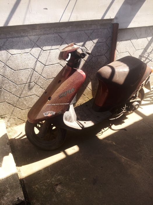 Скутер Сузукі  сепія