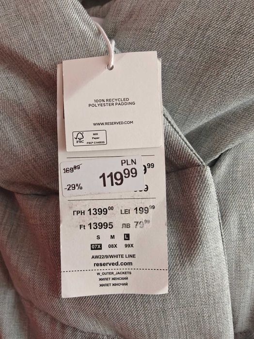 Kamizelka damska ciepła z kapturem.