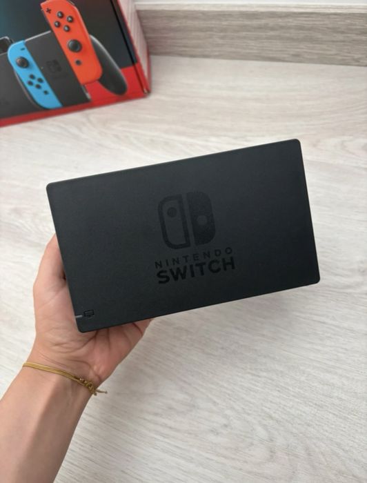 Nintendo Switch  + 2 jogos + bolsa transporte + Comando karts