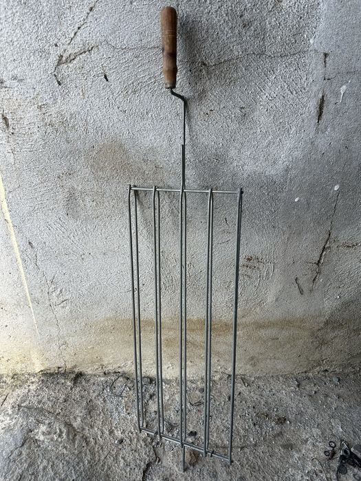 Grelha de churrasco giratória